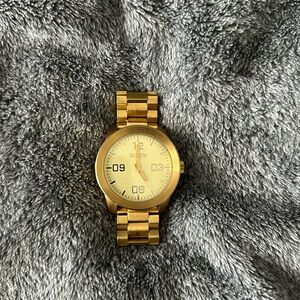 Gold Nixon watch